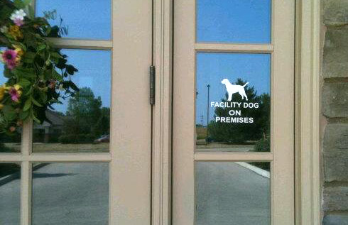 Facility dog sign.